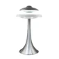 A modern, UFO-shaped LED tabletop lamp with a metallic base and a floating disc design on top.