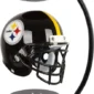 Levitating football helmet with the Steelers logo, supported by a magnetic stand.
