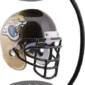 A Jacksonville Jaguars helmet levitates between two black magnetic stands.
