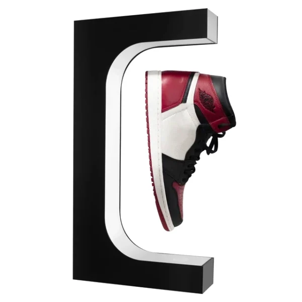 Levitating Shoe Display Floating Sneaker Stand Magnetic Sneaker Shelf With LED Light Rotating Acrylic Holder For Advertising – white light 7 A black, white, and red high-top sneaker displayed hovering in a C-shaped stand.