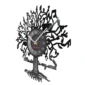 Wall clock with a decorative tree design, featuring musical notes and the phrase "music is my soul" integrated into the branches. The clock face displays time with red and white hands.