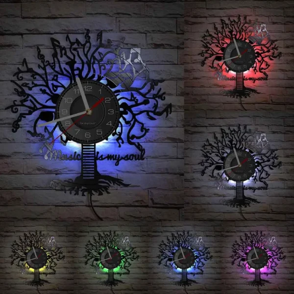 Music is My Soul Modern Design Music Classic Black Hanging Vinyl Record Clocks Wall Watch Home Decor Musician Rock n Roll Gift 5 A wall clock designed as a tree, illuminated in different colors—blue, red, green, yellow, and purple—against a brick background. The phrase "Music is my soul" is visible.