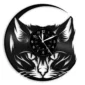 A wall clock with a design featuring a black and white cat face, with the clock face centered between the cat's eyes. The hour and minute hands are visible.
