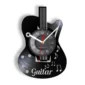 Wall clock designed as a black guitar with musical notes, featuring a circular face with red, black, and white hands.