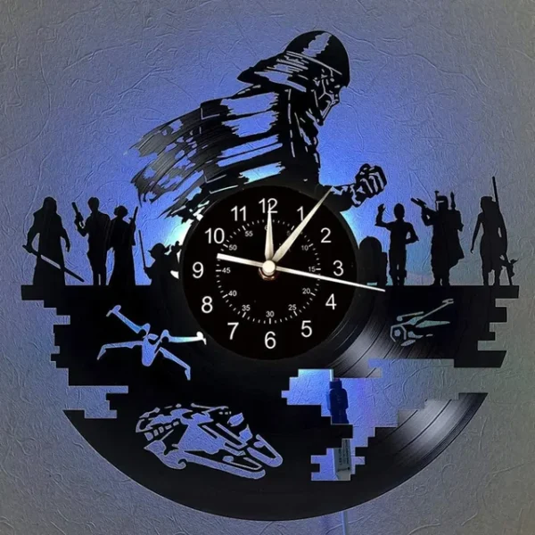 Science Fiction Movie Theme Clock Vinyl Record Wall Clock LED Night Light Home Decoration 7 Color Nightlight Wall Clock Boy Gift – With LED2 10 Wall clock with sci-fi themed silhouettes, including spaceships and characters, illuminated by blue light.