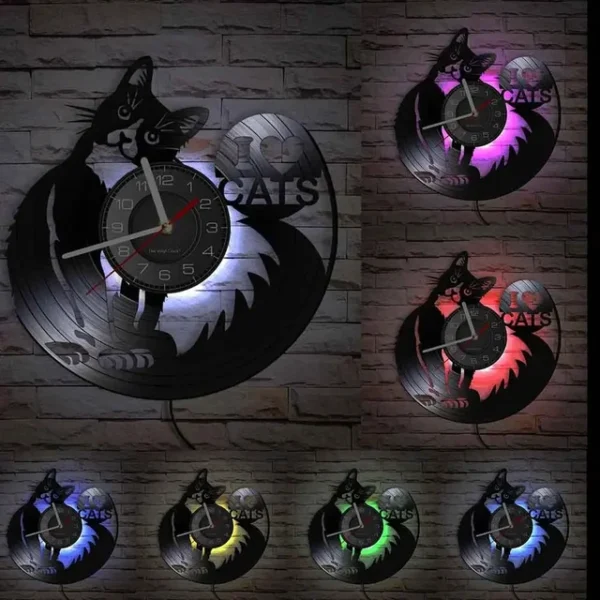 I Love Cats Cute Kitty Rescue Wall Art Silent Clock Lovely Pet Adoption Kittens Home Decor Cat Shop Vinyl Record Hanging Watch – With LED 8 Wall clock featuring a black cat silhouette, lit by various neon colors, displayed against a brick wall.