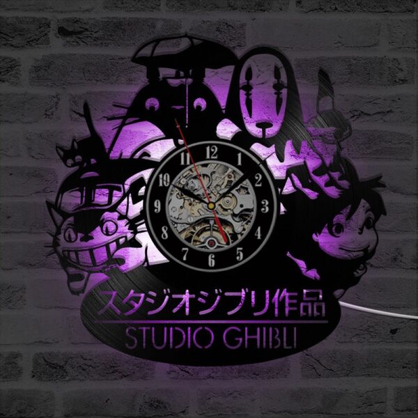 Totoro Studio Ghibli Clock 6 Wall clock featuring Studio Ghibli characters with purple LED backlight and Japanese text, mounted on a dark brick wall.