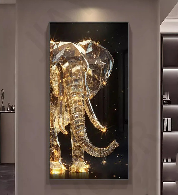 A decorative wall art piece, the Elephant Wall Light features a sparkling gold-colored elephant in a modern interior setting.