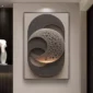 A modern abstract wall art piece featuring overlapping geometric shapes with a textured surface, mounted on a wall.