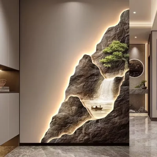 A wall features a carved landscape art piece with illuminated edges, depicting a mountain, waterfall, and tree. It's integrated into a modern interior with marble flooring.