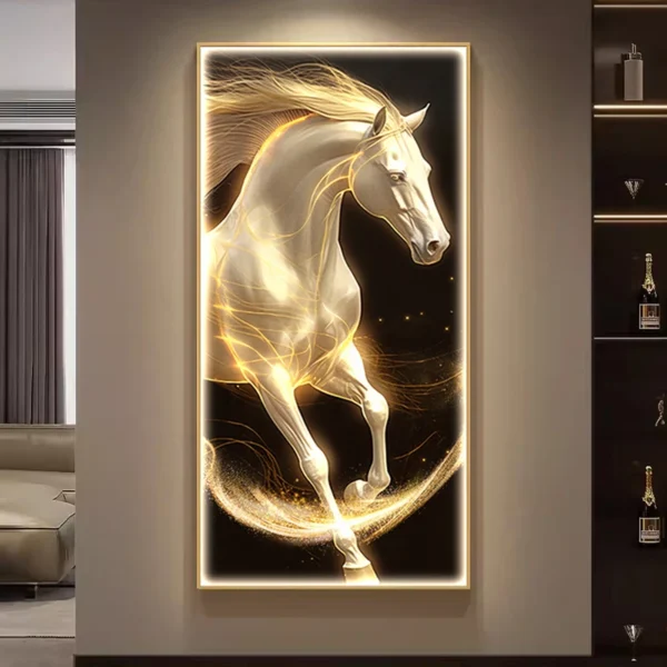 An illuminated painting of a white horse, featuring golden accents, displayed on a wall in a modern living room.
