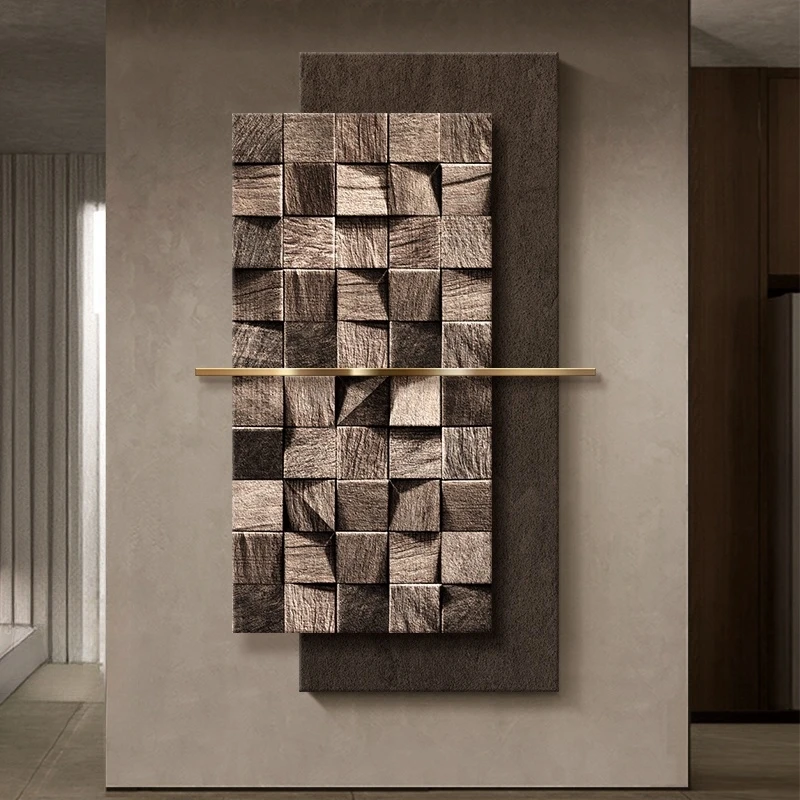 Abstract wall art featuring a textured wooden panel with uneven square patterns, mounted on a dark rectangular background, and intersected by a horizontal gold bar.